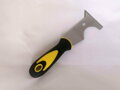 Spatula for removing prints